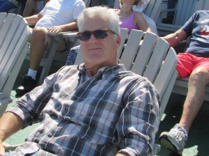 Greg relaxes on a deck chair