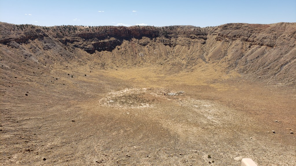 A huge meteor crater in the desert