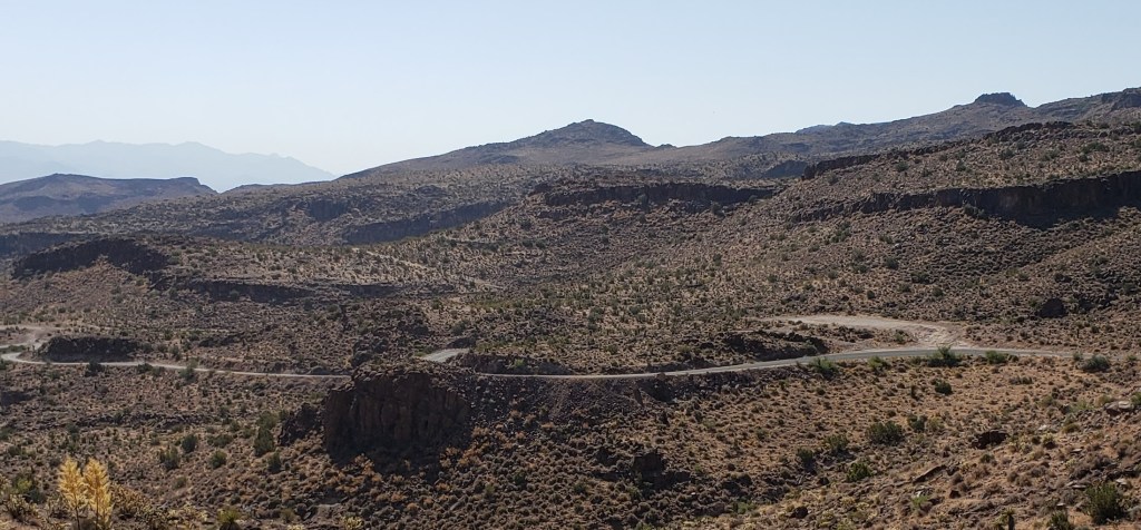 curved roadway headed up mountain