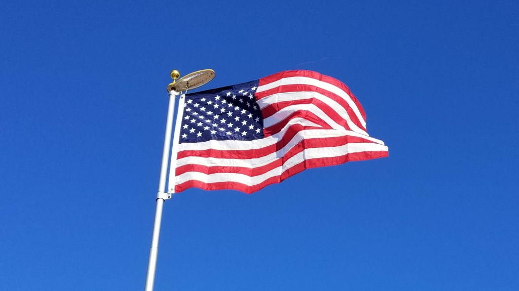 flag against blue sky